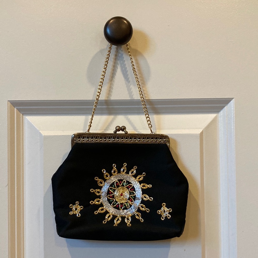 Cute little filagree evening bag.